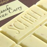 Schell Schokoladentafel Blanche Safran Curry. Weiße Schokolade mit Safran und Curry verfeinert, passend zu edelsüßen Weinen, wie Eiswein, oder Trockenbeerauslese.