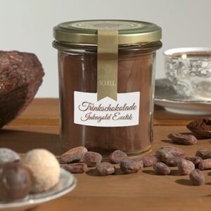 Die Trinkschokolade Inkagold Exotik wird aus Milchschokolade hergestellt, dazu kommt noch schwach entöltest Kakaopulver und für die Süße ist ein bisschen Rohrzucker beigefügt. Schell Schokoladen
