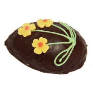 Die Pasteteneier Nougat Krokant von Schell Schokoladen sind verfeinert mit Krokant, Walnüssen und wird umhüllt von von einer knackigen Schicht Krokant und edelherber Schokolade. Zudem sind die Pasteteneier mit gelben Marzipanblumen verziert