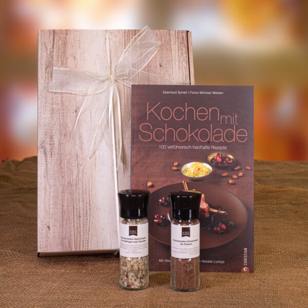 Geschenkpaket Schokokochbox Grande enthält jeweils zwei Schokoladensalze (Fleisch, Geflügel und Gemüse), sowie das Kochbuch "Kochen mit Schokolade"